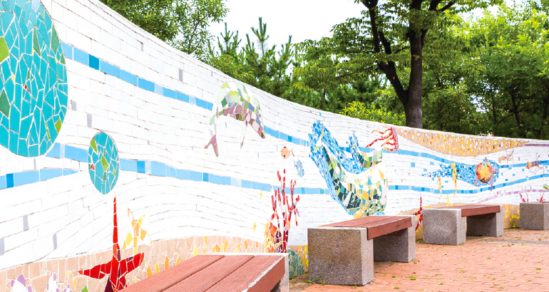 Wall Painting and Benches next to Central Fountain at Haedoji Park